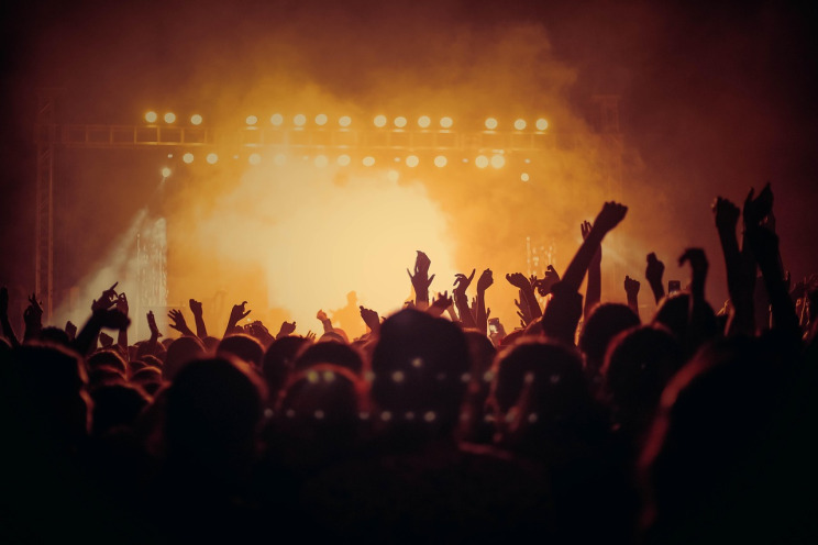 Live music performance uplifting crowd